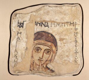 „Święta Anna (malowidło z Faras)”, VIII –I poł. IX wieku, tempera na tynku mułowym, 69 × 68,5 cm, Muzeum Narodowe w Warszawie, domena publiczna.